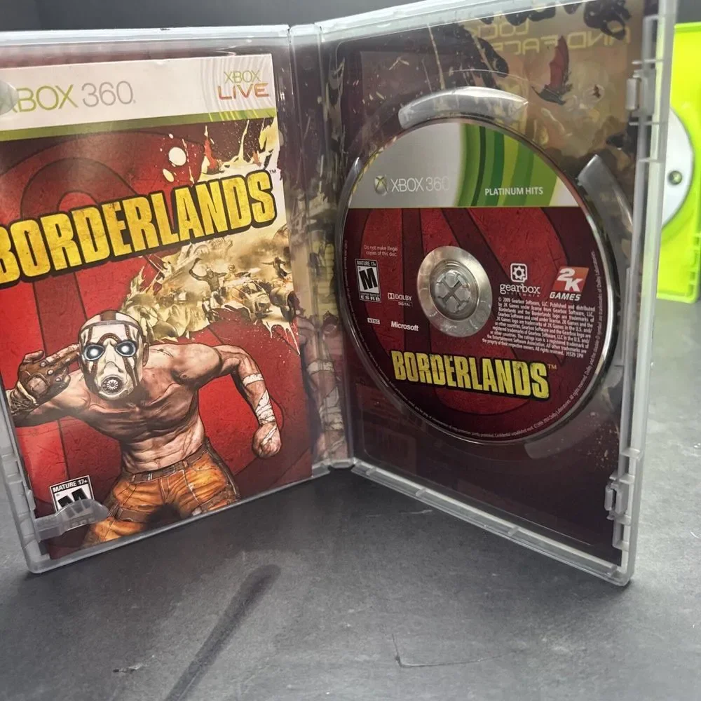 xbox  game lot Borderlands,‎ Assassin's Creed, Skyrim